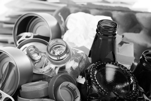Workers loading segregated recyclables at a transfer facility