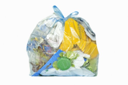 Team inspecting commercial waste containers in Gerrards Cross